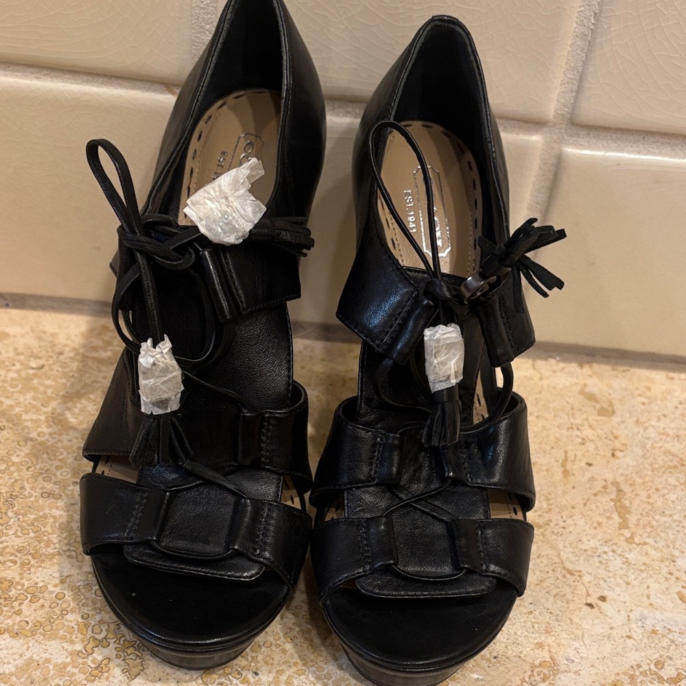 Coach Black Leather Platform Heels Tassel Tie - metal C charm